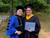 Brookdale Community College President David M. Stout, Ph.D., congratulates William A. Salcedo, Executive Director of Big Brothers Big Sisters of Coastal & Northern New Jersey who was awarded an honorary associate’s degree during Commencement