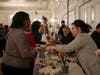 Guests enjoying a variety of over 20 different food options from premier local restaurants and caterers. 