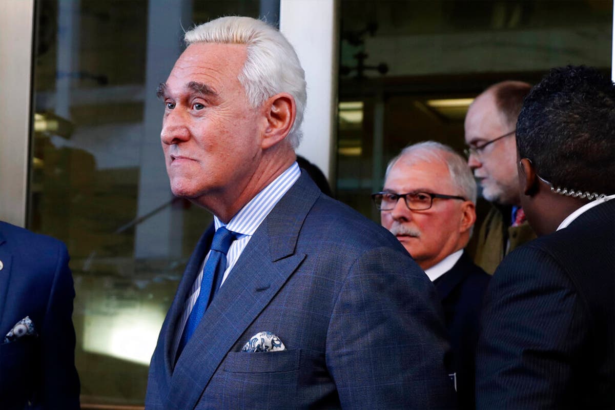 Former Trump campaign adviser Roger Stone leaves federal court Thursday, after a judge imposed a gag order.