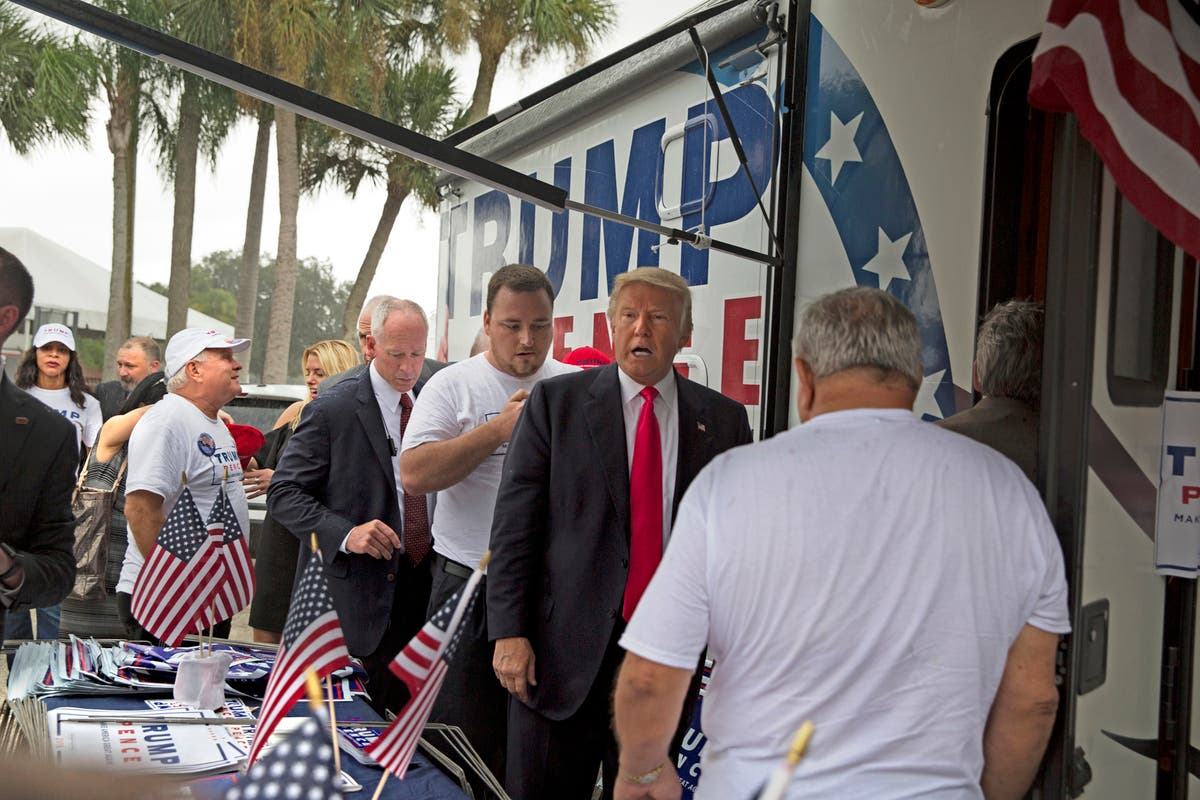 Trump meets supporters organizing voter registration and support for his campaign just before a rally in Tampa.