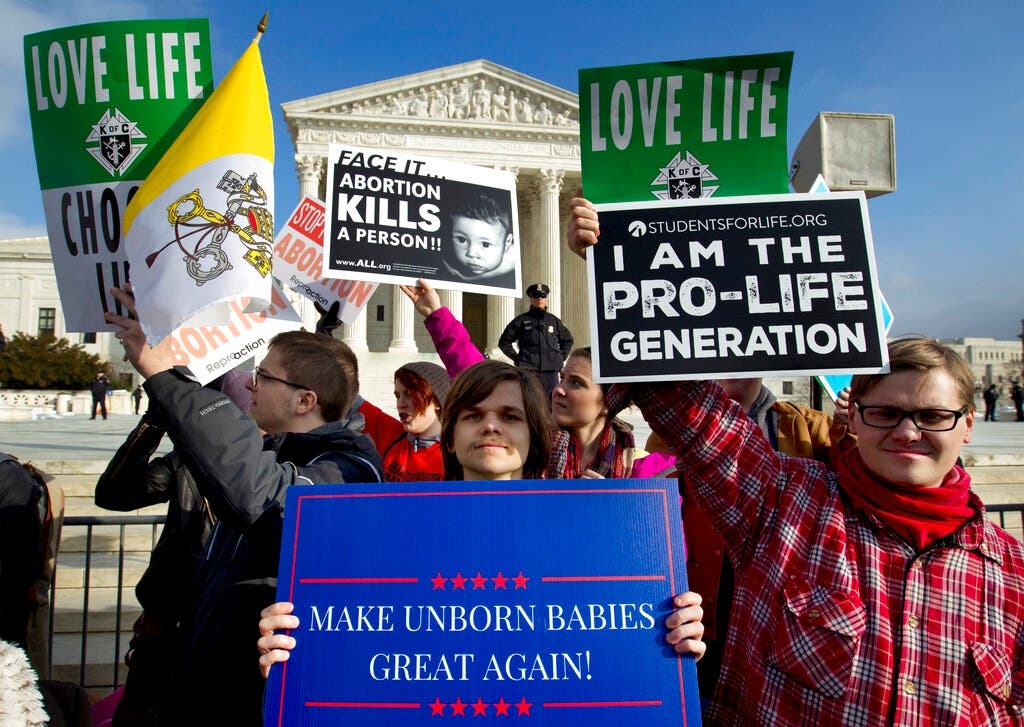 Anti-abortion activists demonstrate outside the Supreme Court building during the recent March for Life rally.