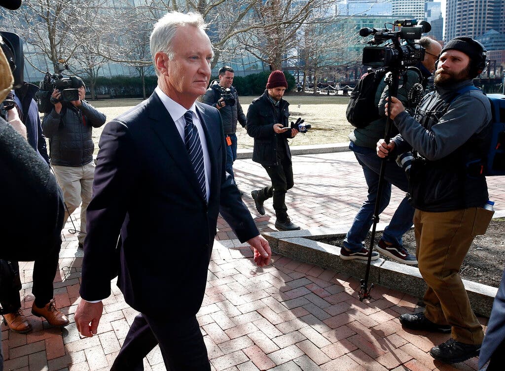 Toby MacFarlane, one of the defendants in the college admissions bribery scandal, leaves a federal courthouse in Boston.