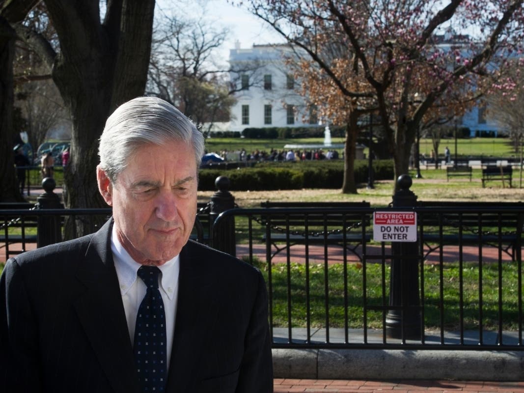 Special counsel Robert Mueller walks past the White House after attending services at St. John's Episcopal Church.