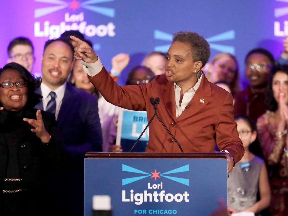 Lori Lightfoot waves to supporters as she speaks at her election night party in Chicago.