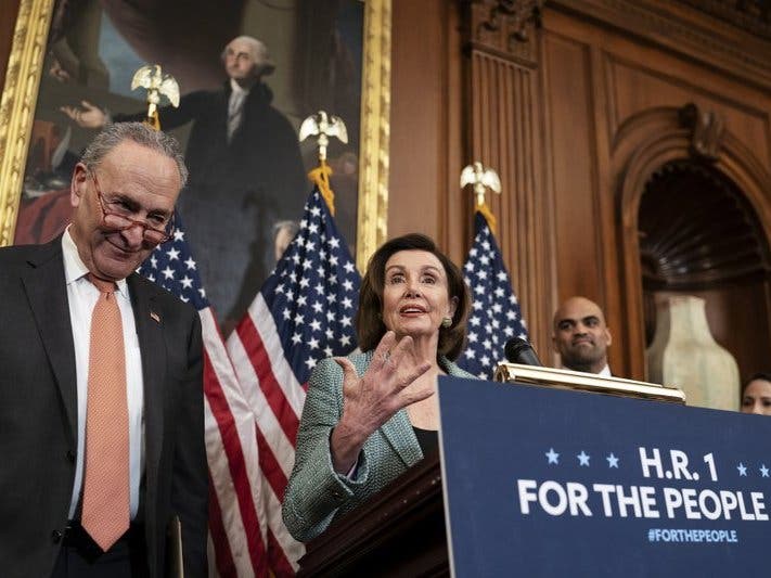 Senate Minority Leader Chuck Schumer, D-N.Y., left, and Speaker of the House Nancy Pelosi, D-Calif., call on Senate Majority Leader Mitch McConnell, R-Ky., to bring the Democrats' For The People Act to the floor for a vote.