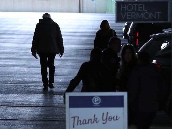 Democratic presidential candidate Sen. Bernie Sanders walks to his car after speaking to reporters on Wednesday in Burlington, Vt. 