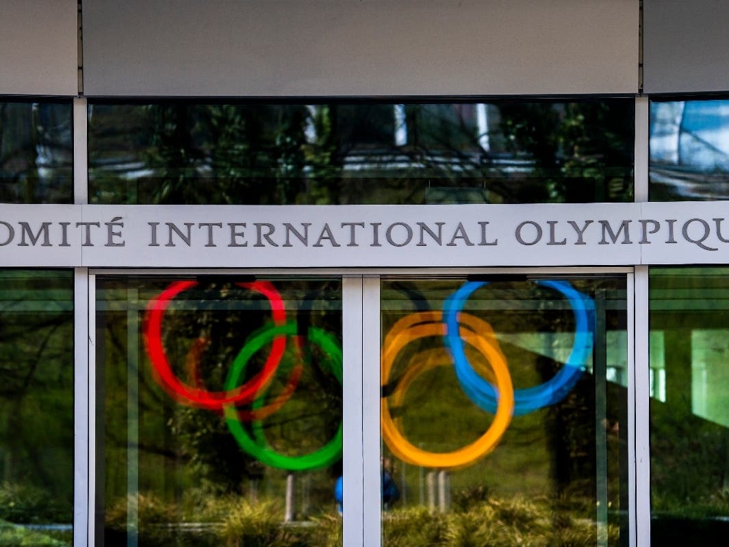 The Olympic Rings are displayed at the entrance of the IOC, International Olympic Committee headquarters during the coronavirus disease (COVID-19) outbreak in Lausanne, Switzerland, Tuesday, March 24, 2020.