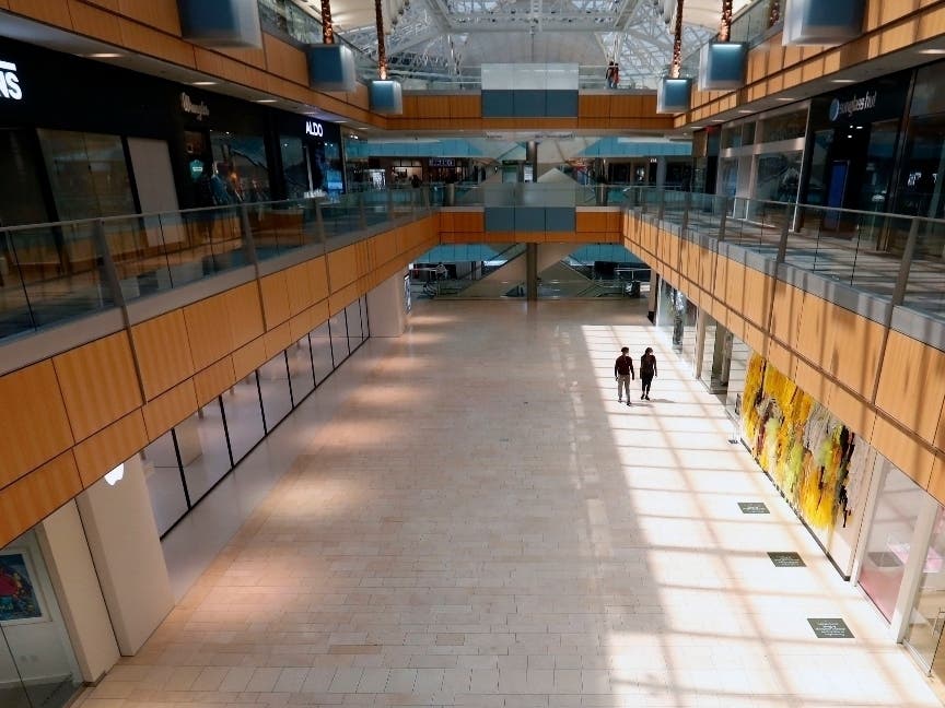 Amid concerns of the spread of COVID-19, few shoppers are seen at the Galleria Dallas mall in Dallas.