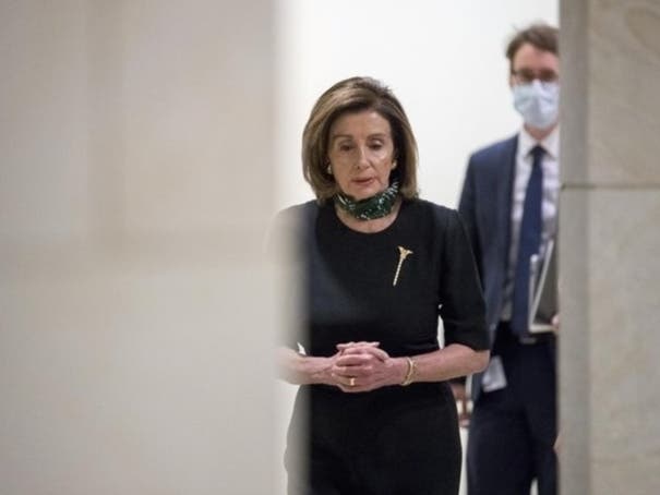 House Speaker Nancy Pelosi of Calif., arrives for a news conference on Capitol Hill.