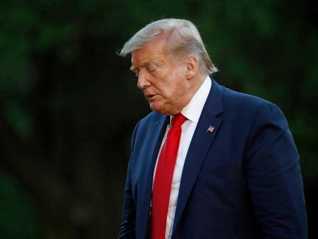 President Donald Trump walks across the South Lawn of the White House in Washington, D.C.