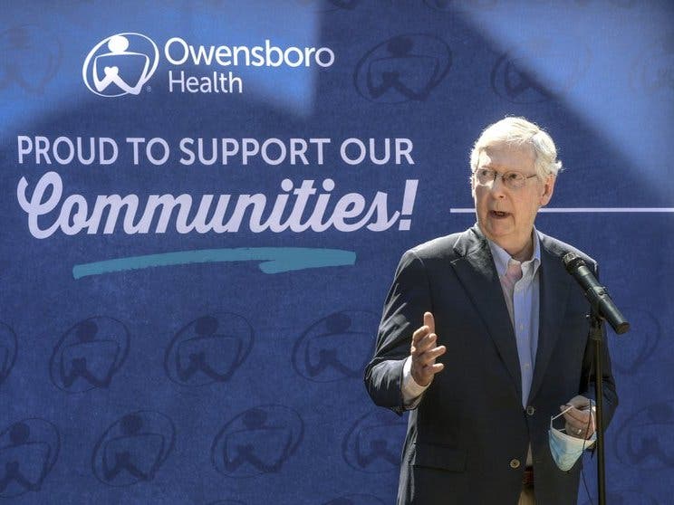U.S. Senate Majority Leader Mitch McConnell speaks outside of the Owensboro Health Muhlenberg Community Hospital during a press conference Tuesday in Greenville, Ky. 