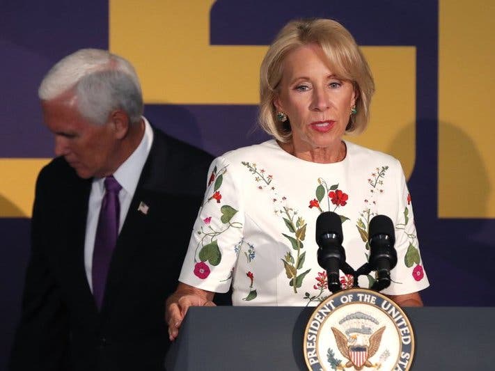 Education Secretary Betsy DeVos speaks at a news conference with Vice President Mike Pence in Tiger Stadium on the LSU campus in Baton Rouge.