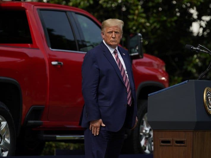 President Donald Trump pauses as he speaks during an event on regulatory reform on the South Lawn of the White House on July 16.