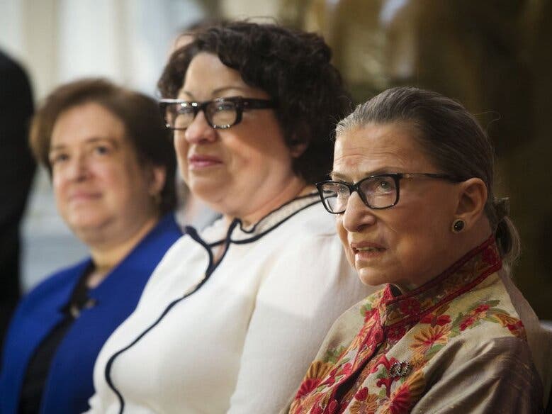 From left, U.S. Supreme Court, Associate Justices Elena Kagan, Sonia Sotomayor, and Ruth Bader Ginsburg, on stage during a Women's History Month reception in March at Statuary Hall on Capitol Hill