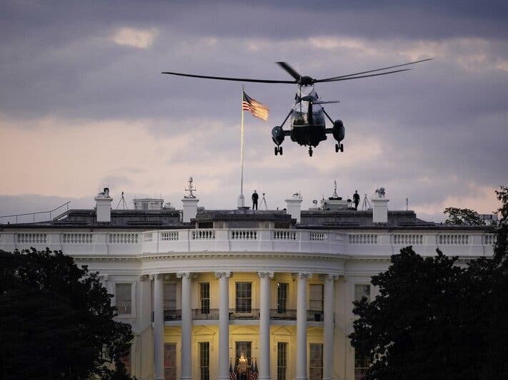 President Donald Trump arrives back at the White House aboard Marine One, Monday evening after being treated for COVID-19 at Walter Reed National Military Medical Center.