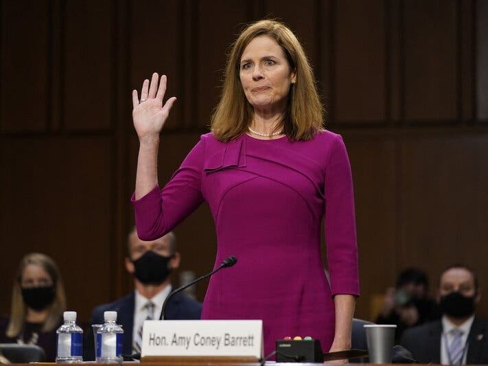 Supreme Court nominee Amy Coney Barrett is sworn in during a confirmation hearing before the Senate Judiciary Committee on Capitol Hill in Washington.