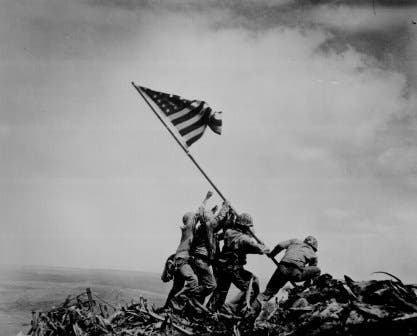 Marines raise The U.S. Flag on Mt. Suribachi WWII