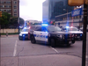 Police respond to the scene of a shooting in Dallas, Texas, on Monday.