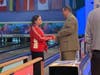 Amanda Naujokas receives a medal from the president of the United States Bowling Congress.