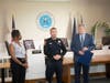 Suffolk Police Officer Craig Capobianco​ was off duty and surfing July 28 when a fellow surfer got hurt. He was honored for his actions.