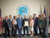 Suffolk Police Officer Craig Capobianco​ was off duty and surfing July 28 when a fellow surfer got hurt. He was honored for his actions.