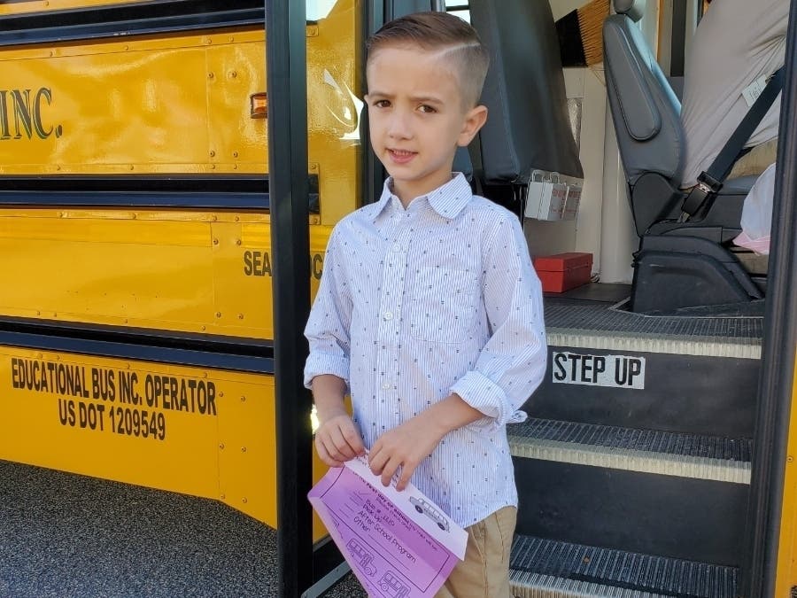 Riley Hannigan, 6, gets on the bus to go to 1st grade at Wantagh Elementary.