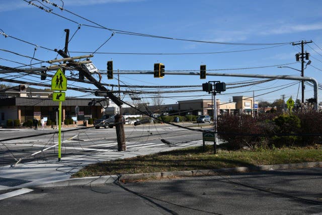 Dump Truck Pulls Down Wires, Snaps Poles In Hicksville: PHOTOS ...