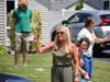 Retiring Principal Jeanmarie Wink waved to students, staff, families, PTA members, district administrators and board members during her surprise parade.