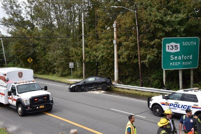 Jericho Turnpike Crash Sends Car Through Traffic Sign | Syosset, NY Patch