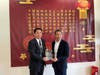 Walnut City Mayor Eric Ching, right, is presented with Who Stole Their Youth by a representative of Tai Ji Men dizi. The book talks about the fabricated and unjust Tai Ji Men case and includes comments from scholars and experts.