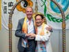 Kenneth Jacobsen, practice professor of law at Temple University, left, and Dr. Hong, Tao-Tze, the leader of Tai Ji Men, embrace each other after Prof. Jacobsen rang the Bell of World Peace and Love. 