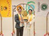 Dr. Hong, Tao-Tze, president of FOWPAL and leader of Tai Ji Men, right, presents the “Key to the Heart” to California State Senator Josh Newman. The key symbolizes that key leaders’ kind thoughts can move the world in the right direction.