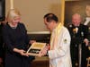 Dr. Hong, Tao-Tze, president of FOWPAL, right, presents the “Key to the Heart” to Irina Vlah, governor of ATU Gagauzia, Moldova. The key symbolizes that conscience is the key to a peaceful world.