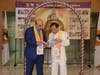 Dr. Hong, Tao-Tze, president of FOWPAL, right, and Nasirli Emil, founder and editor-in-chief of “My Azerbaijan” International Magazine, read a book titled History of International Day of Conscience. 