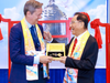 Eric Roux, vice president of the European Office of the Church of Scientology, has a joyful dialogue with Dr. Hong, Tao-Tze, leader of Tai Ji Men. Eric Roux rang the Bell of World Peace and Love and made a wish for peace on Aug. 14.