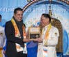 Amb. Nestor Mendez, Assistant Secretary General of the Organization of American States, left, receives the “Key to the Heart” from Dr. Hong, Tao-Tze, president of FOWPAL. The key symbolizes that a visionary leader plays a vital role in shaping the world’s