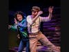 Scat, the enchanted fish played by Jacob Yeh and Jonner, the well-meaning fisherman played by Jared H. Graham. 