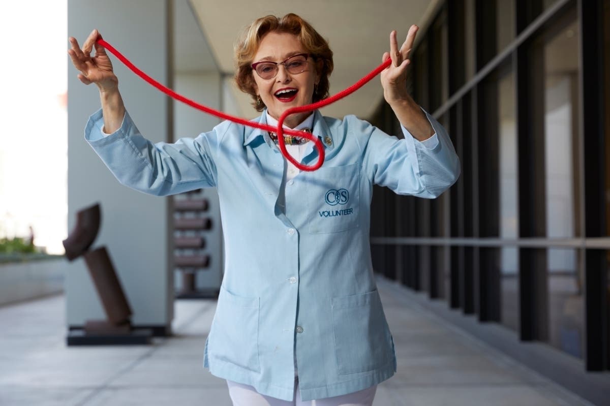 Patricia Marquis performs magic tricks for patients at Cedars-Sinai Medical Center.