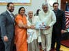 Prashant Kumar, Mrs Santosh Kumar, Chandlal Kumawat and Sagar Kumar honoring our senior Mrs. Bhagwatiben Ruparel