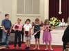 3rd graders receive Bibles from the Presbyterian Church of Chatham Township