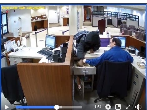 This video shows Bruce Carter robbing one of the bank employees at First Midwest Bank on Feb. 6. 