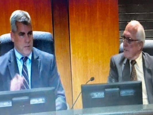 Mayor Bob O'Dekirk takes Pat Mudron to task during Tuesday night's council meeting, but Mudron got his way. 