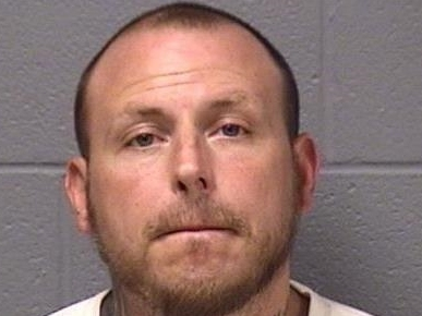 This Joliet man has a felony warrant for his arrest. 