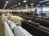 Friday morning's ribbon-cutting took place around 9:50 a.m. for the new Pottery Barn Outlet in Joliet. 