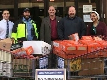 Members of the Joliet Police Department collected food in recent weeks to donate to Guardian Angel Services. 