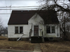 The city of Joliet has filed a lawsuit in hopes of getting legal authority to demolish this structure on Holmes Avenue.