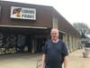 Local business owner Frank Kafka has chosen to keep his K's Liquors and Foods store open near Route 59 in Shorewood. 