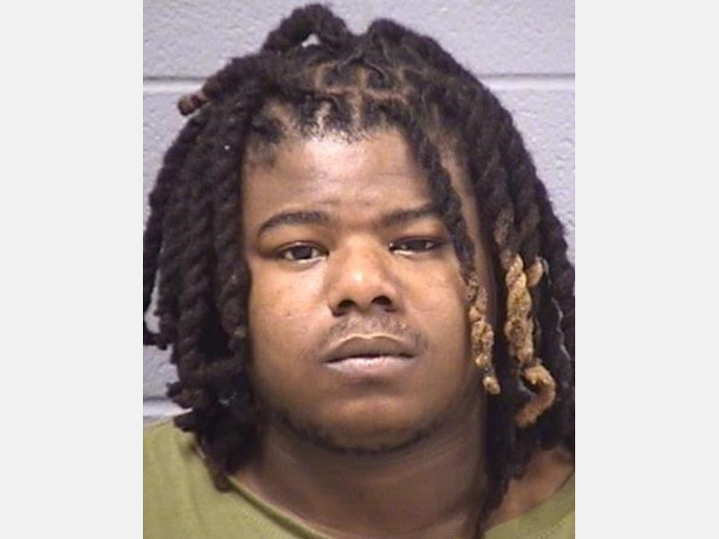 Dartavius Payton has been charged in connection with Tuesday night's high-speed chase that began moments after a 20-year-old man was gunned down in Joliet.