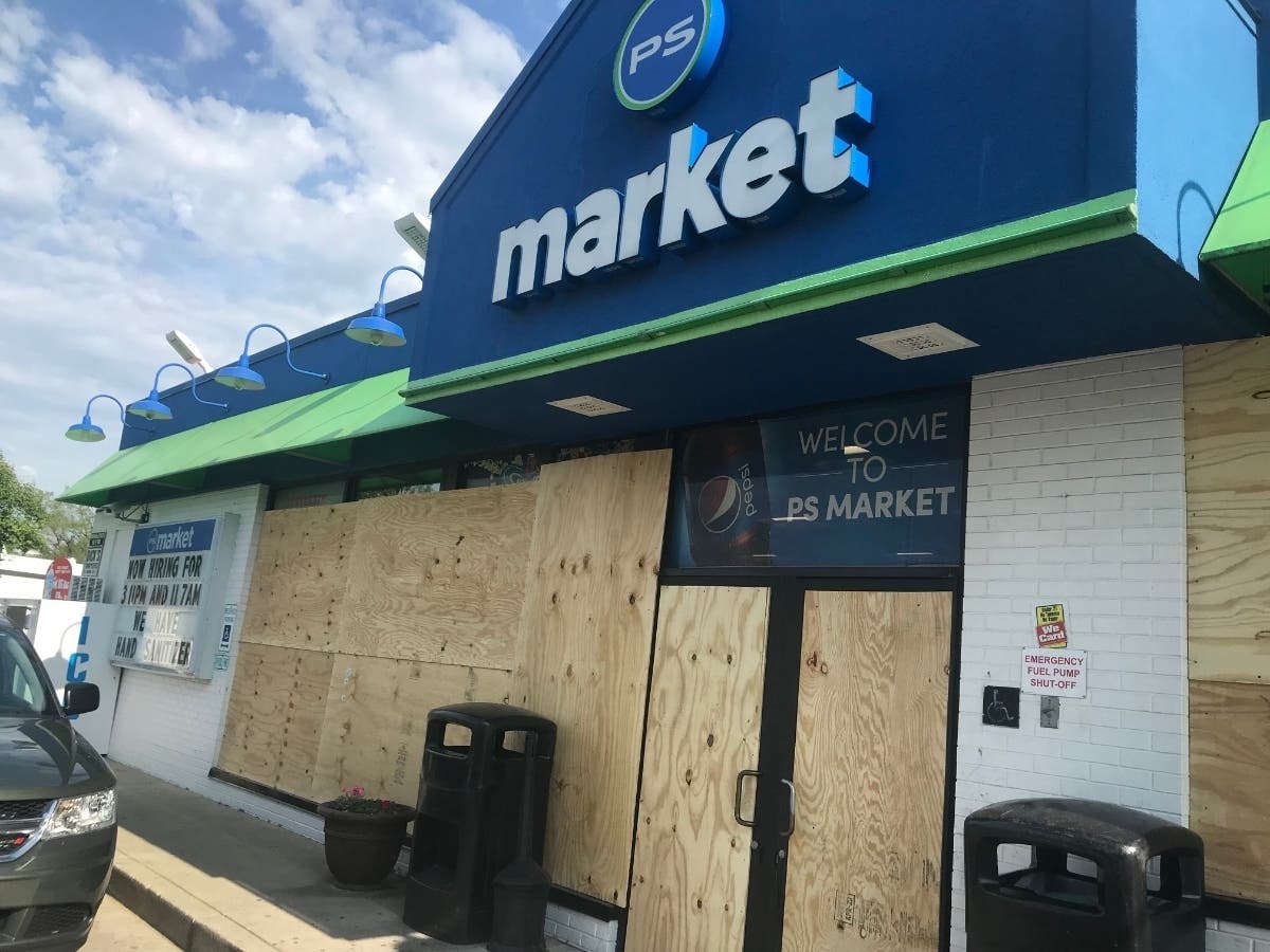 Terry Lambert's PS Market on Joliet's West Jefferson Street was hit by looters late Sunday night, but the owner said he was fortunate the criminals were unable to get his cash register, his cigarettes and lottery tickets as they tried.