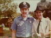 Joliet Police Officer Ed Rachel, left, with Dan Aykroyd on the set of The Blues Brothers at the Old Joliet Prison.